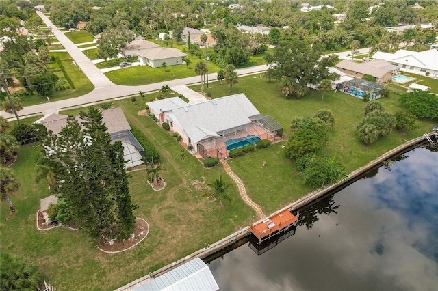 drone / aerial view with a water view