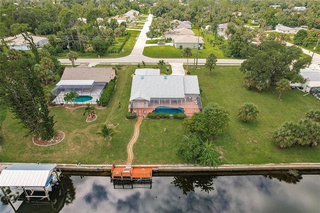 drone / aerial view with a water view