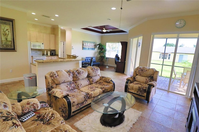 living room with plenty of natural light and ornamental molding