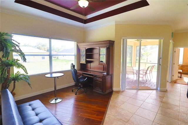 office area featuring ornamental molding, light hardwood / wood-style flooring, and ceiling fan