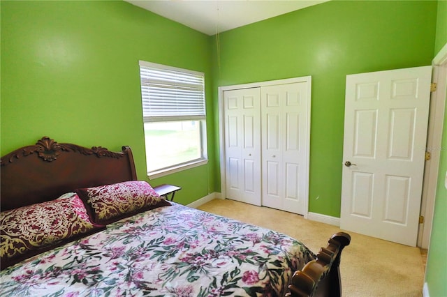 carpeted bedroom with a closet