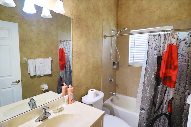 full bathroom with vanity, toilet, and shower / bath combo