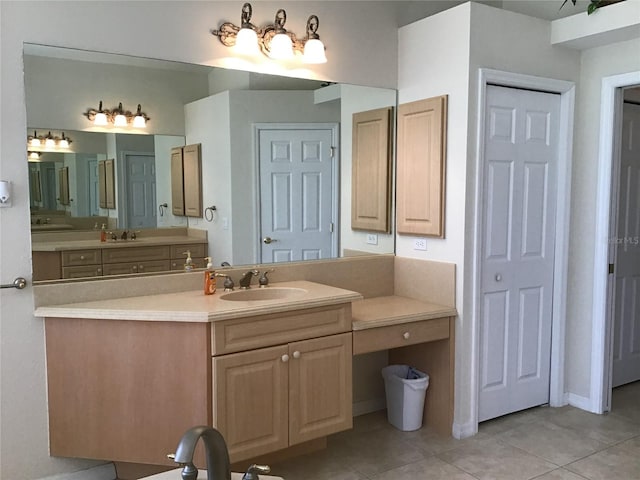 bathroom featuring tile patterned floors and vanity