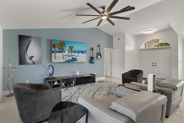 tiled living room featuring lofted ceiling and ceiling fan