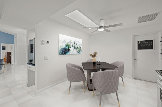 dining space featuring ceiling fan