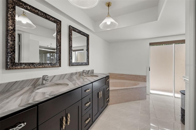 bathroom with tile patterned flooring, vanity, and separate shower and tub