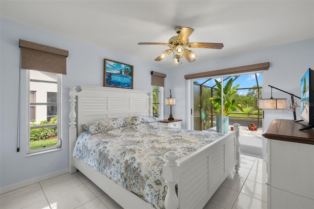 bedroom featuring access to outside, light tile patterned floors, and ceiling fan