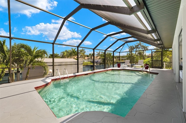 view of pool featuring a lanai and a patio area