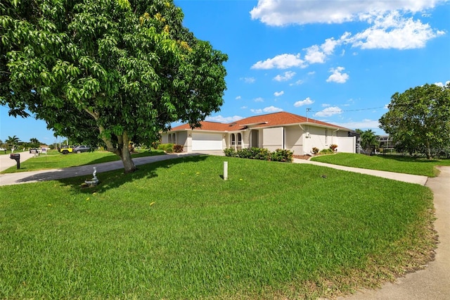 ranch-style house with a front yard and a garage