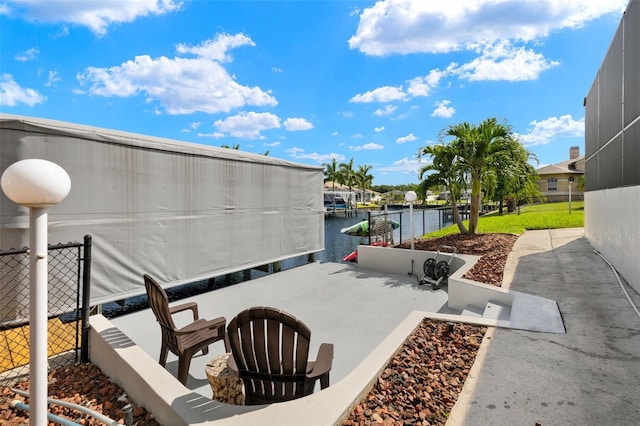 view of patio / terrace featuring a water view