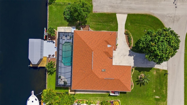 birds eye view of property featuring a water view