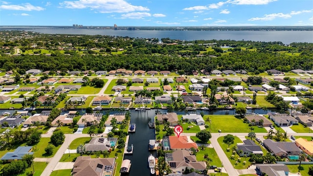 drone / aerial view with a water view