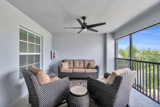 sunroom / solarium with ceiling fan