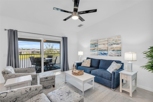 tiled living room with ceiling fan