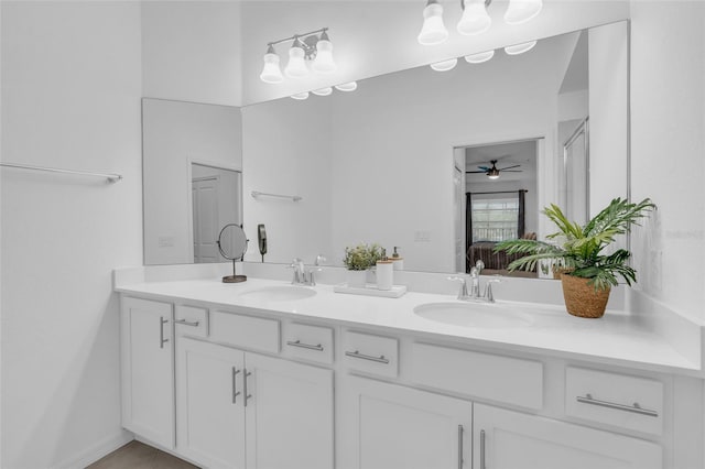 bathroom featuring vanity and ceiling fan