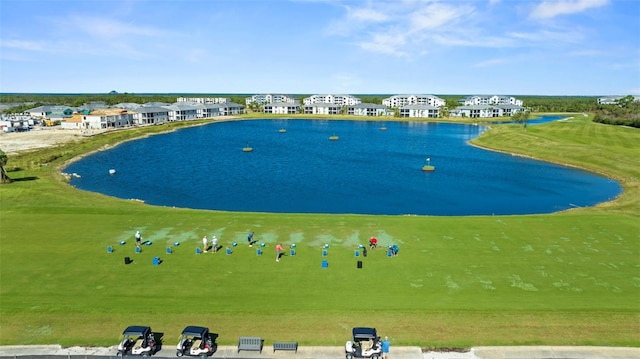 view of home's community with a water view