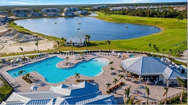 view of pool featuring a gazebo, a water view, and a patio area