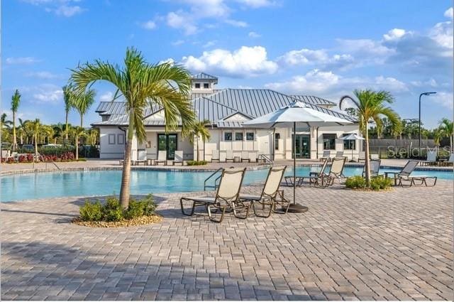 view of pool with a patio