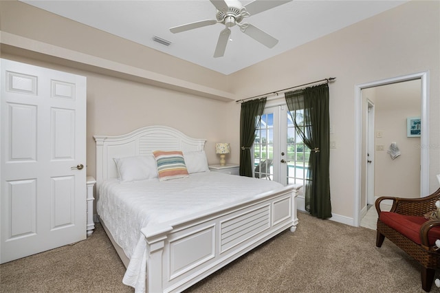 bedroom with french doors, access to outside, ceiling fan, and carpet flooring