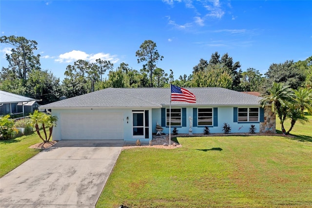 single story home featuring a front lawn and a garage