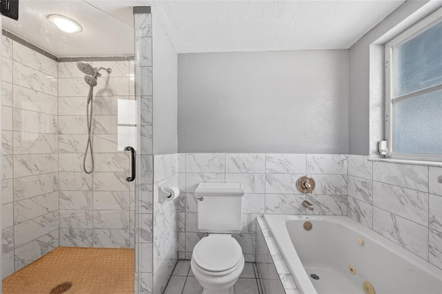 bathroom with tile walls, toilet, tile patterned flooring, and shower with separate bathtub