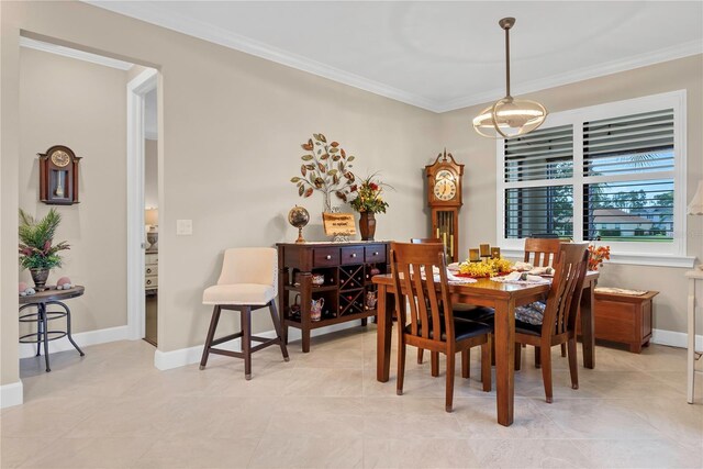 tiled dining room with ornamental molding