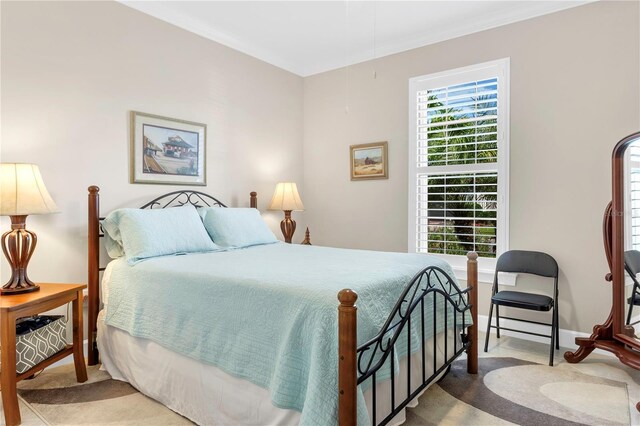 bedroom featuring ornamental molding