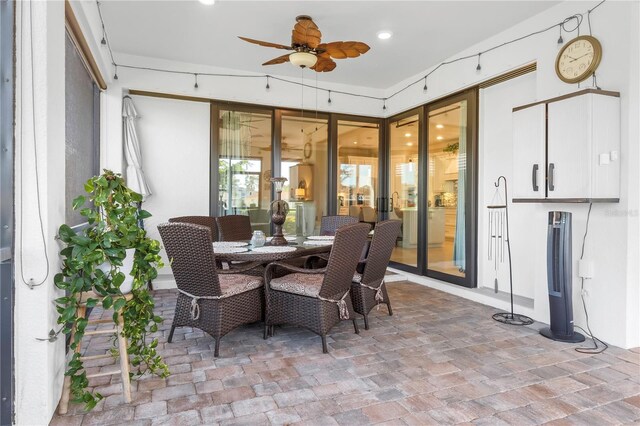 dining room featuring ceiling fan