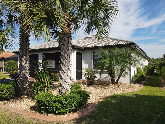 exterior space with a lawn