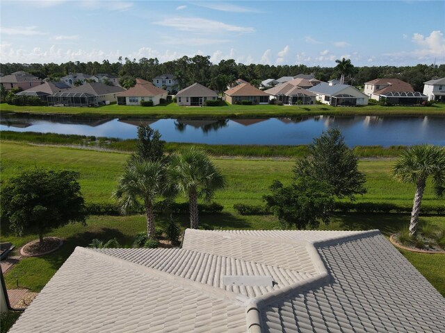 drone / aerial view with a water view