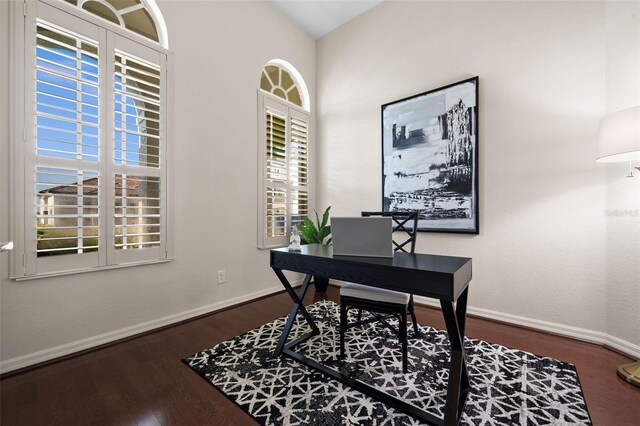 home office featuring dark hardwood / wood-style flooring