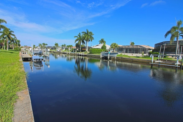 view of water feature with a dock