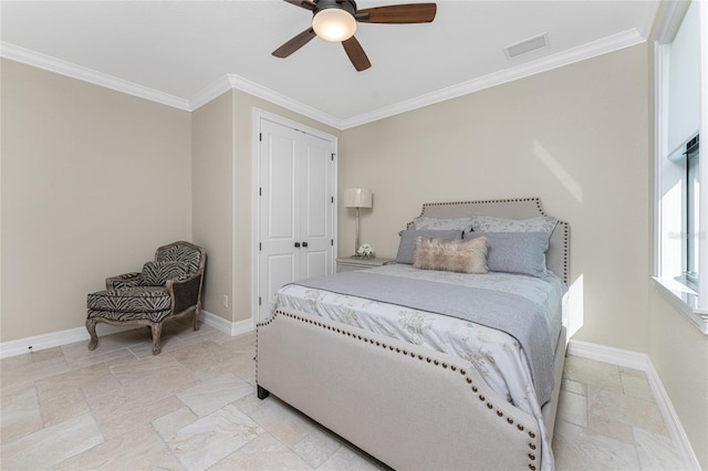 bedroom featuring a closet, ceiling fan, and crown molding