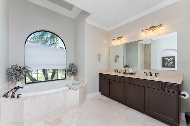 bathroom with ornamental molding, tiled tub, and vanity