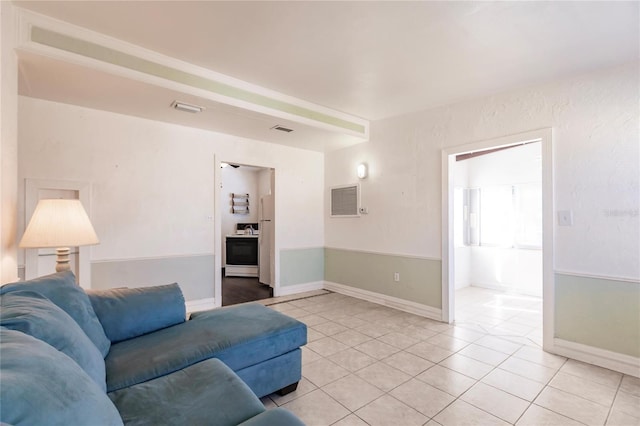 living room with light tile patterned floors