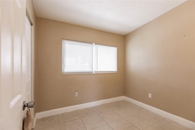 view of tiled empty room