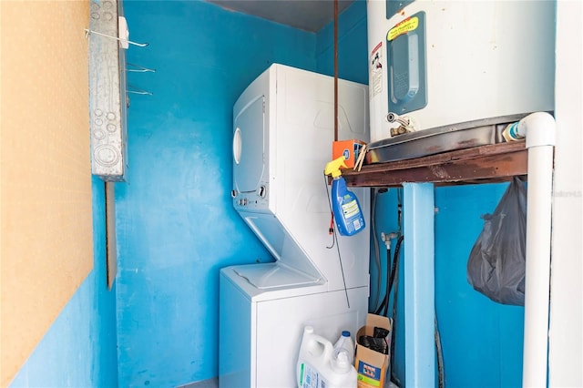 washroom with stacked washer and clothes dryer