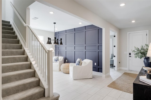 living room with light tile patterned floors