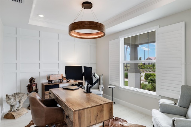 office area featuring a healthy amount of sunlight, ornamental molding, light tile patterned floors, and a raised ceiling