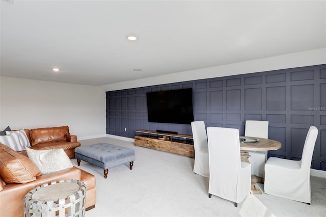 living room featuring light carpet