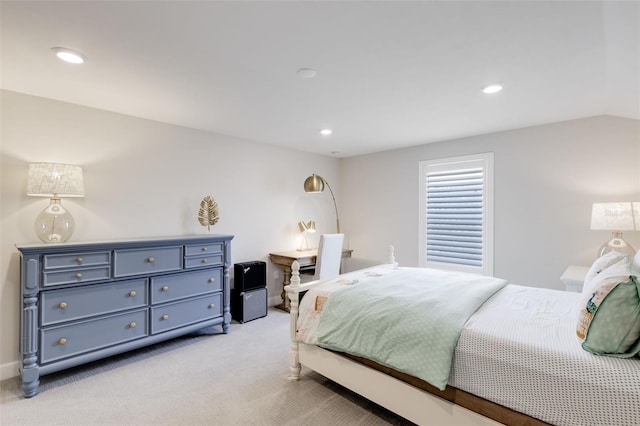 bedroom featuring light carpet