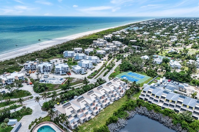 aerial view featuring a water view and a view of the beach