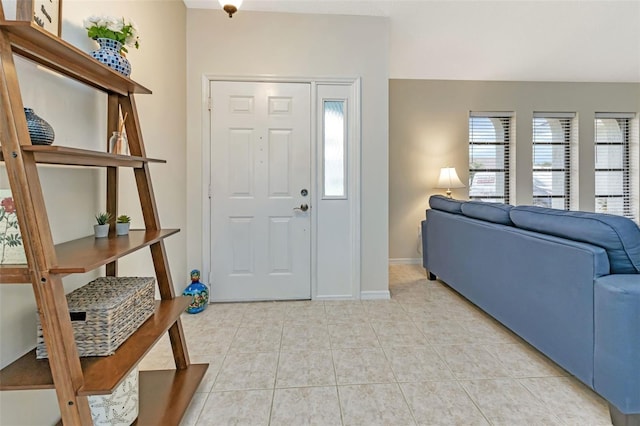 entrance foyer featuring light tile patterned floors