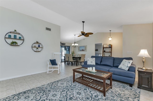 tiled living room with lofted ceiling and ceiling fan