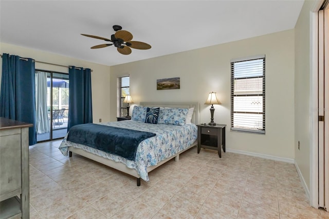 tiled bedroom featuring multiple windows, access to exterior, and ceiling fan