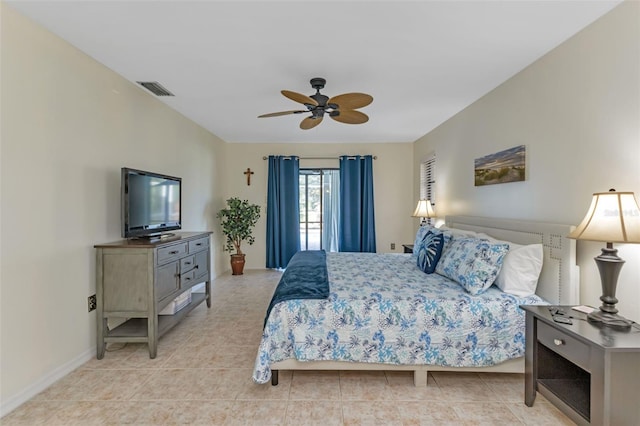 bedroom featuring ceiling fan and light tile patterned floors