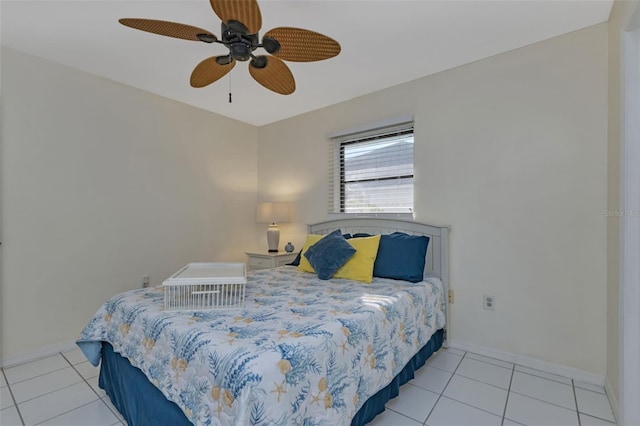 bedroom with ceiling fan and light tile patterned floors