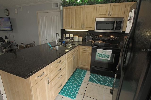 kitchen with black appliances, light brown cabinetry, kitchen peninsula, sink, and light tile patterned flooring