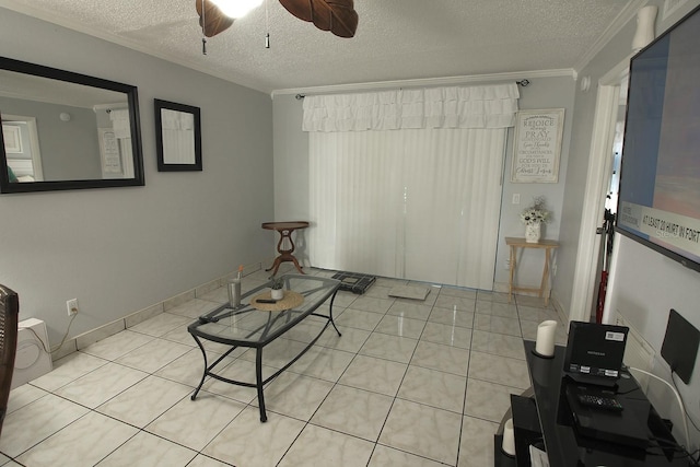 tiled living room with ceiling fan, crown molding, and a textured ceiling