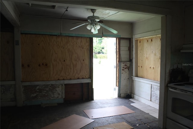 interior space featuring ceiling fan